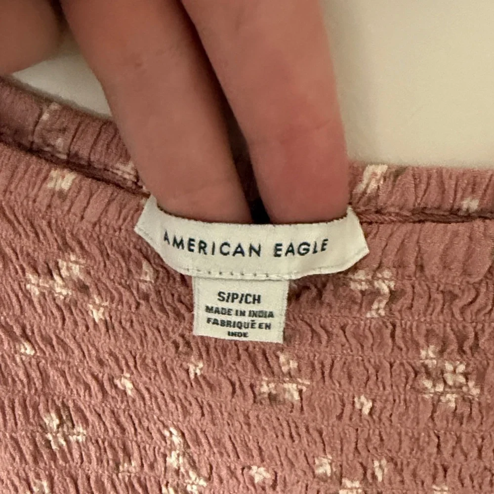 64. | American Eagle | Pink Floral Smocked Romper - Picture 3 of 6